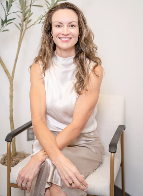 Dr. Langelier Smiling and Posing towards Camera