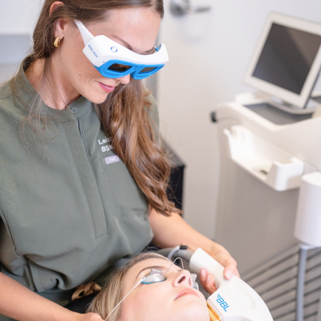 A woman emphasizing the importance of self-care and beauty enhancement.